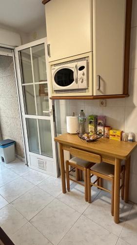 Kuchyň nebo kuchyňský kout v ubytování Duplex Olas de Ribadeo