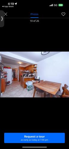a picture of a kitchen and a dining room with a table at Kuca Ljepa in Zoganj