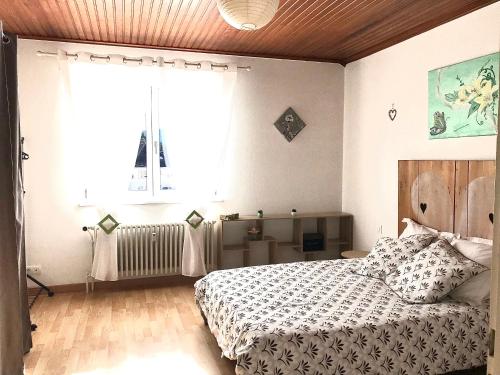 Ένα ή περισσότερα κρεβάτια σε δωμάτιο στο O SONHO CasaSavernoise appart1