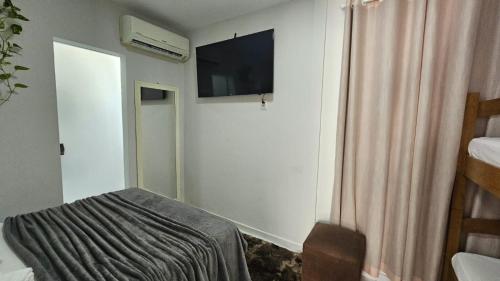 Ein Bett oder Betten in einem Zimmer der Unterkunft Apto Diamante