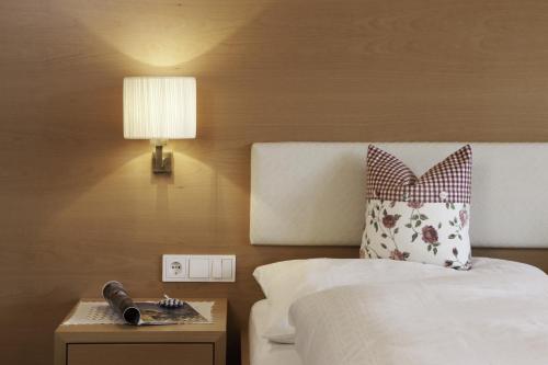 Un pat sau paturi într-o cameră la Appartement Isabella
