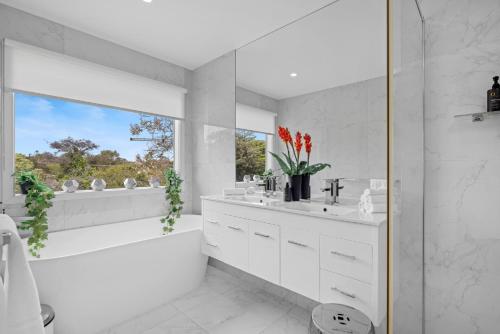 Et badeværelse på Moonah Woodlands Resort