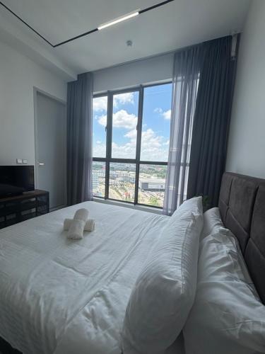 Postel nebo postele na pokoji v ubytování Skytrees Comfort Room With Simple Design Concept
