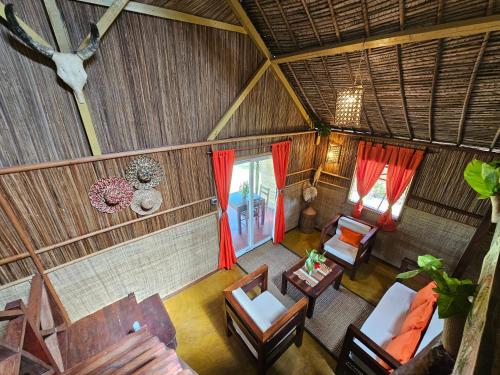 an overhead view of a living room in a hut at KINTANA LODGE in Ile aux Nattes