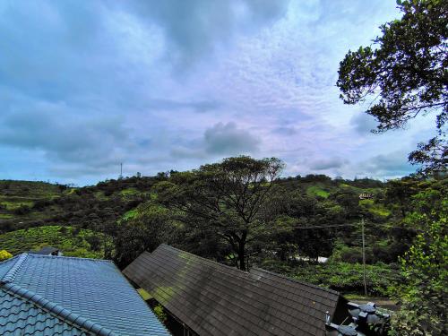 a view from the roof of a house at The Autumn by Maat Hotels in Vagamon