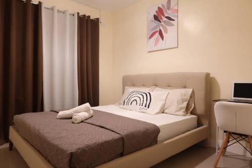 Postel nebo postele na pokoji v ubytování Skyline Home Antipolo
