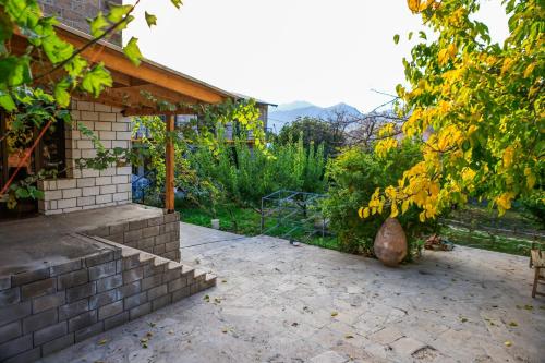a patio of a house with a fence at Areni Wine Art in Areni