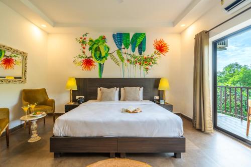 Postel nebo postele na pokoji v ubytování Locomo Boutique, Morjim - Cozy tropical stay, near beach