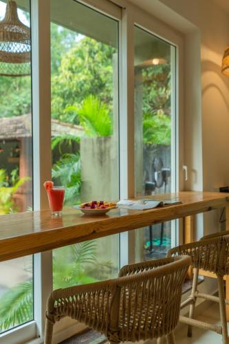 Zahrada ubytování Locomo Boutique, Morjim - Cozy tropical stay, near beach
