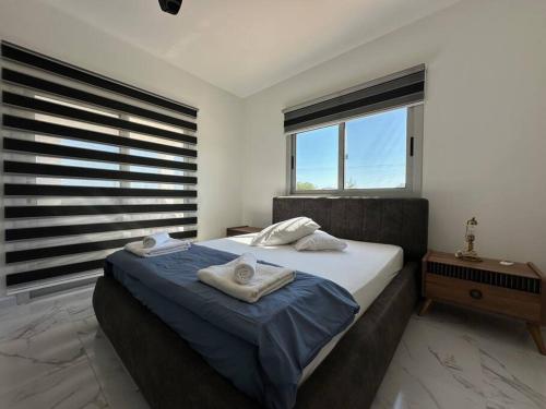 Postel nebo postele na pokoji v ubytování Luxury Villa Bogaztepe By MyGuest Cyprus