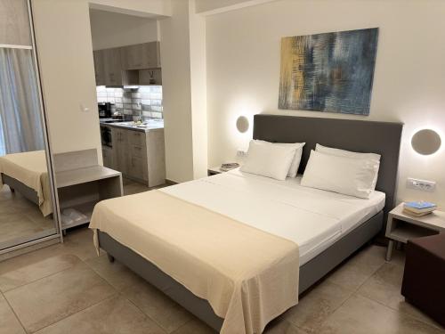 Letto o letti in una camera di Melydron Apartments
