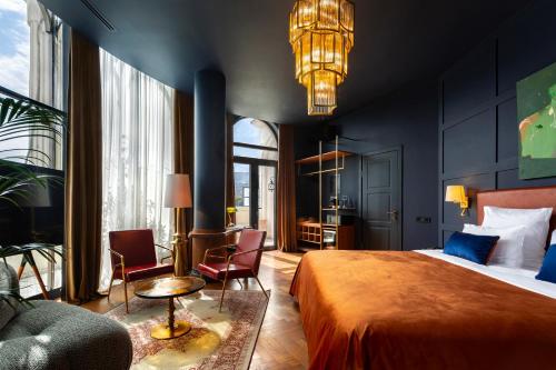 Postel nebo postele na pokoji v ubytování Zorba&Bond Boutique Hotel