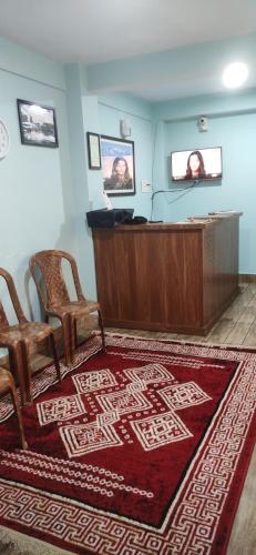 TV a/nebo společenská místnost v ubytování Hotel Pearl Retreat