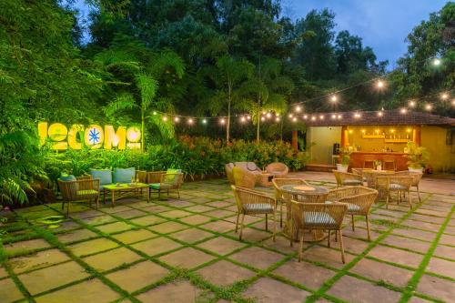 Zahrada ubytování Locomo Boutique, Morjim - Cozy tropical stay, near beach