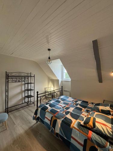 Postel nebo postele na pokoji v ubytování Gîte de Pennenez