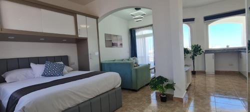 Ένα ή περισσότερα κρεβάτια σε δωμάτιο στο Beautiful Apartment in Egyptian Experience Resort