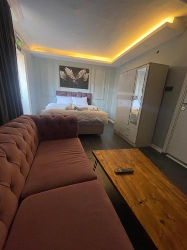 Katil atau katil-katil dalam bilik di Kıyı Butik Otel