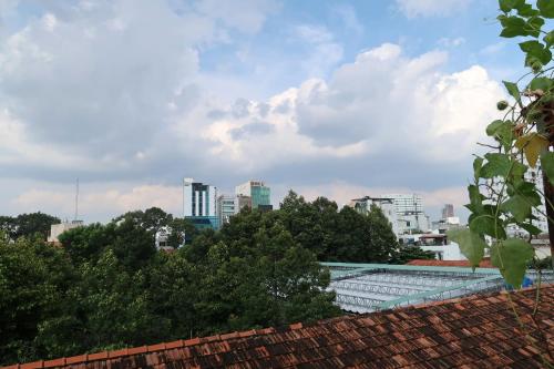 a view of the city from the roof of a building at Huong's Homestay in Ho Chi Minh City