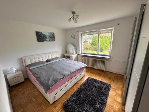 Postel nebo postele na pokoji v ubytování Stilvolle 2-Zimmer-Anliegerwohnung in Tuttlingen