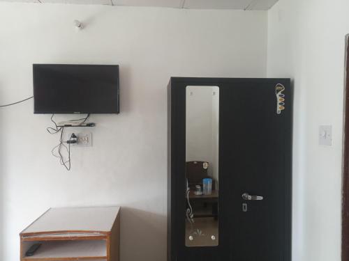 Μια τηλεόραση ή/και κέντρο ψυχαγωγίας στο Nirmal Homestay