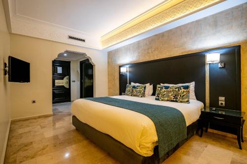 Ένα ή περισσότερα κρεβάτια σε δωμάτιο στο Diwan Casablanca Hotel & Spa