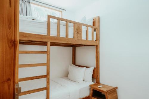 Кровать или кровати в номере Coco Lemon Gili Resort