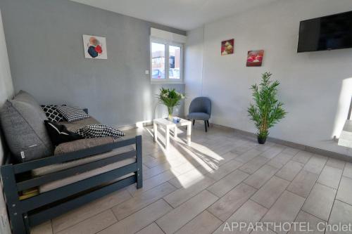 Χώρος καθιστικού στο Appart' hôtel Cholet