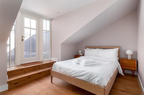 Ένα ή περισσότερα κρεβάτια σε δωμάτιο στο Beachfront Penthouse by the Old Course