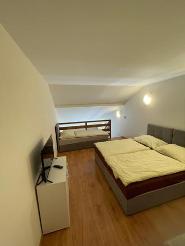 Postel nebo postele na pokoji v ubytování Hotel Prom