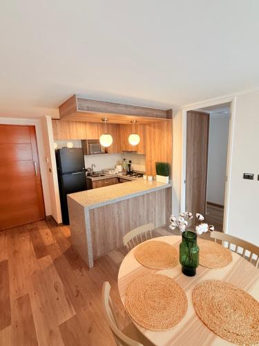 Una cocina o kitchenette en Departamento con estacionamiento incluido, Ideal para ir de compras y conectar con puntos turísticos