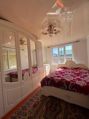 Postel nebo postele na pokoji v ubytování Ethno homestay