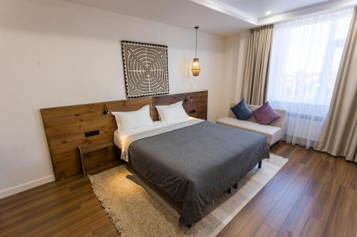 Cama o camas de una habitación en Akjola Hotel