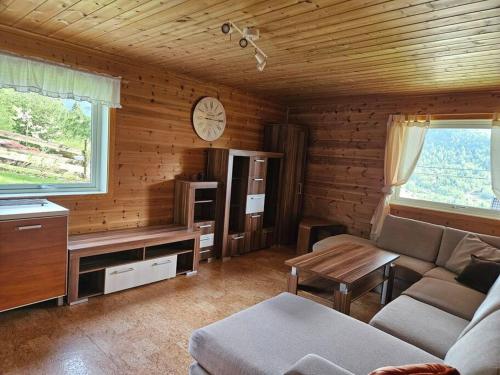 Posezení v ubytování Leilighet med fantastisk utsikt!