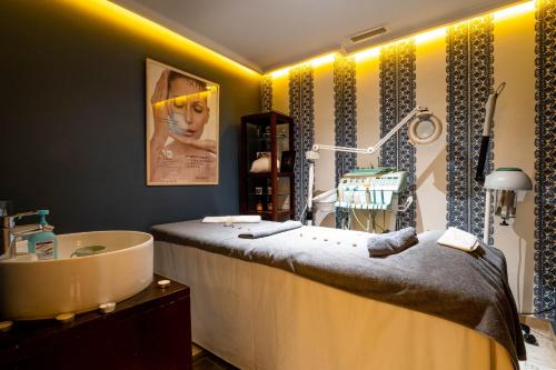 Ένα ή περισσότερα κρεβάτια σε δωμάτιο στο Diwan Casablanca Hotel & Spa