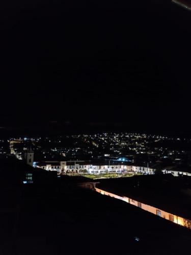 a view of a city at night at Hotel Chachapoyas in Chachapoyas