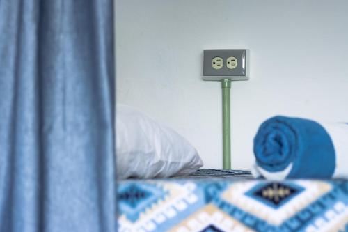 Katil atau katil-katil dalam bilik di Hostal Cuca Macuca