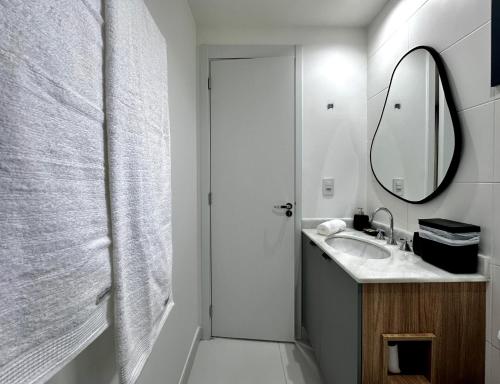 Ένα μπάνιο στο Studio com piscina a 1 minuto a pé do Metrô Brooklin