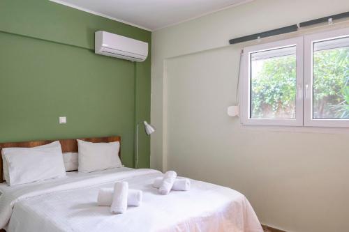 Katil atau katil-katil dalam bilik di Dousma Apartment