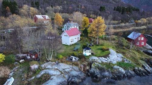 an aerial view of a house on an island at Sigerfjordveien 501 in Sortland