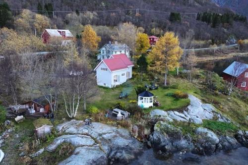 an aerial view of a house on a small island at Sigerfjordveien 501 in Sortland