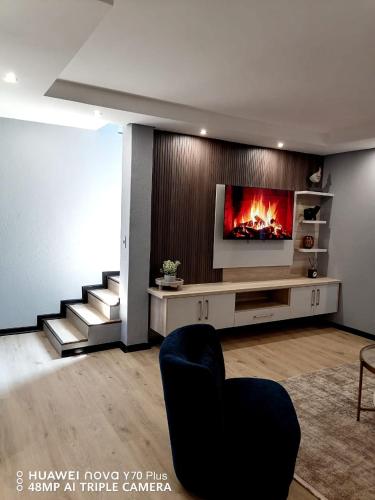 Ruang duduk di Uptown Apartments - Garden Pavillion