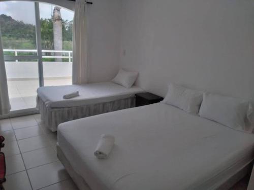 Postel nebo postele na pokoji v ubytování Casablanca Same Suite Lagunas del Golf