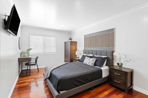 Ένα ή περισσότερα κρεβάτια σε δωμάτιο στο Central Location Family Size Home