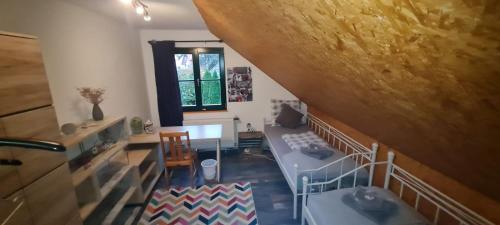Postel nebo postele na pokoji v ubytování Gemütliche Wohnung auf dem Ziegenhof