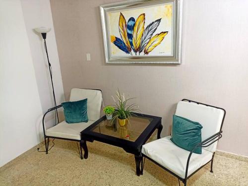 Χώρος καθιστικού στο Habitacion en el centro