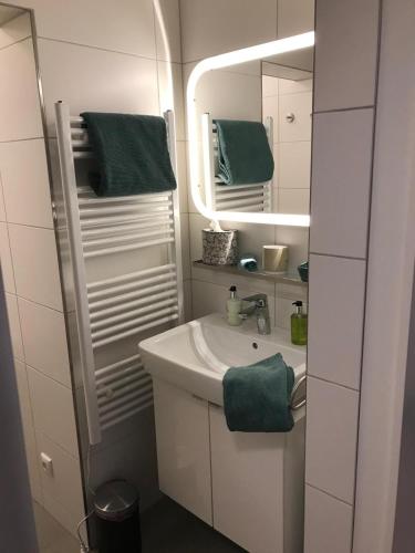 Ένα μπάνιο στο Kleine feine Wohnung Gmunden City