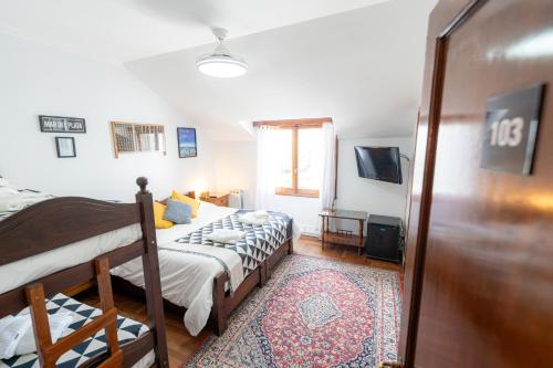 Postel nebo postele na pokoji v ubytování Casa Camaron