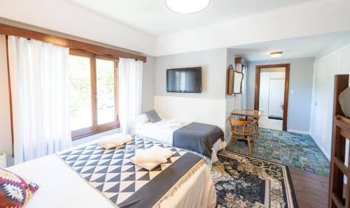 Postel nebo postele na pokoji v ubytování Casa Camaron