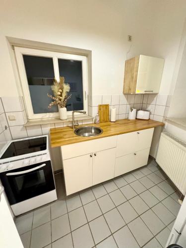 Foto Ferienwohnung Schildblick Modernes Apartment direkt in der Altstadt von Erfurt nahe der Krämerbrücke - beste Innenstadtlage 4