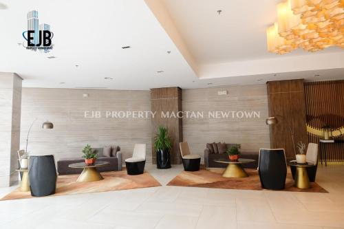 a lobby of a miami metropolitan newedition synagogue at Mactan Newtown Beach Condo in Mactan